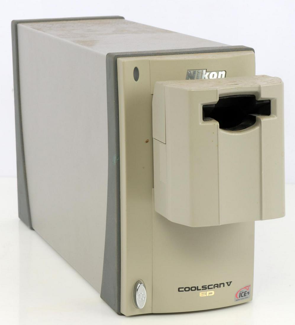 NIKON COOLSCAN V ED FILM & SLIDE SCANNER DEVICE: In good physical and cosmetic condition. Comes with one attachment already in coolscan. No cord present.