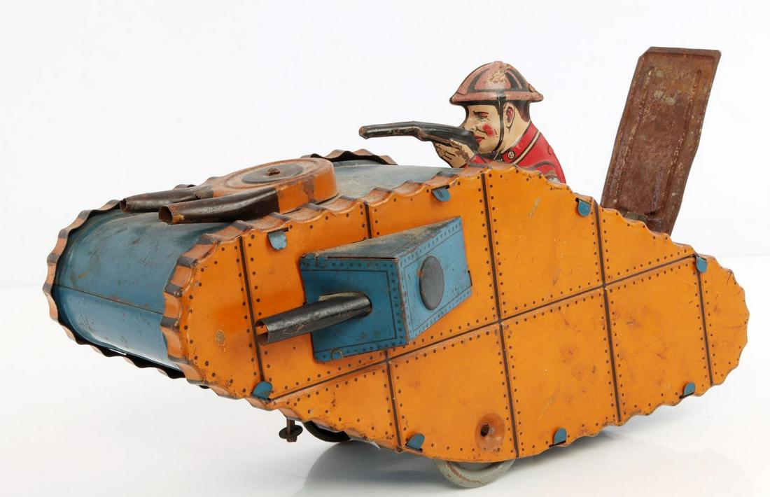 LOUIS MARX & CO WWI LANDSHARK TANK WIND UP MODEL: Exterior in good condition with most of paint finish remaining. Upper turret still swivels. Wind up mechanism still works although can be finicky.
