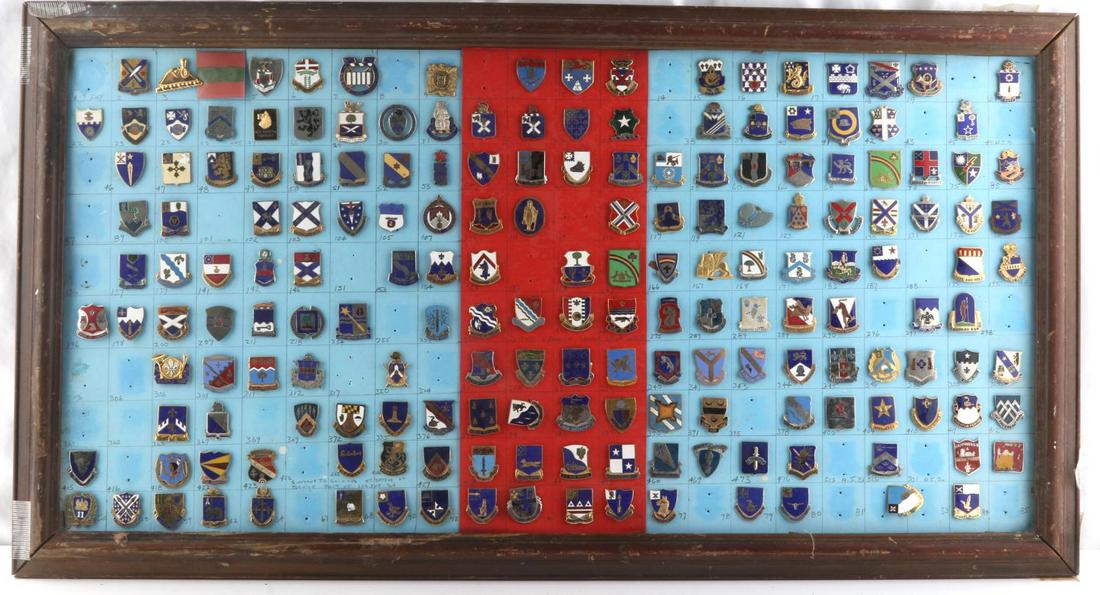 183 US ARMY WWII TO VIETNAM INFANTRY DUI BADGE LOT: Some scarce issues and includes the famed Vietnam Snoopy badges. Framed on a board and could be removed to reduce shipping cost per winning bidder's request.