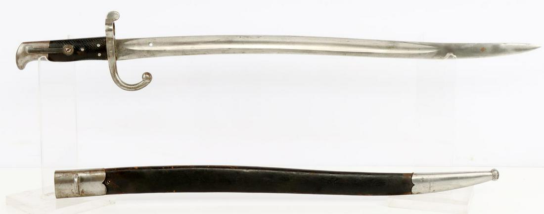 PRE WWI GERMAN CAPTURE OF FRENCH CHASSEPOT BAYONET: Blade from Chassepot bayonet with small hole poked through near bottom, marked "E. BR. Weyersberg Solingen" on ricasso with a crown on the opposite side. Crossguard is marked "D 10.138" and "2741" on 
