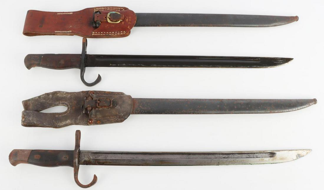 WWII JAPANESE ARISAKA BAYONETS W/ FROG & SCABBARD: Two included, both with Kokura arsenal markings on ricasso. Scabbards and frogs in good condition. Some surface loss on crossguard and pommel. One has grease on blade.