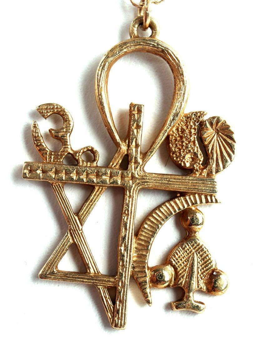 14KT GOLD DESIGNER ONENESS RELIGIOUS ICON PENDANT: 14kt gold designer religious pendant by Isaac Soltes, Oneness Symbol 1971. This pendant is made up of six religious symbols and is marked "Isaac B. Soltes 1971" on the back. Includes a 24 inch 14kt go