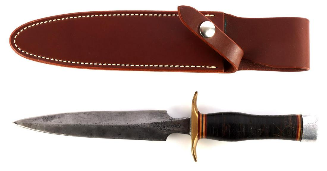 VINTAGE 1950'S RANDALL KNIFE MODEL 2 STILLETO: 1950's Randall made fighting stilleto fixed knife with a 6 7/8 inch double sided blade (sharpened), brass double finger guard, leather wrapped commando handle with 8 spacers and a nickel butt. Total l