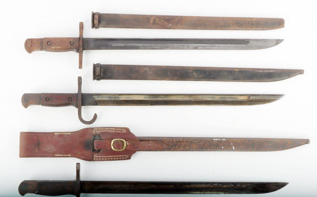 WWII JAPANESE BAYONET LOT OF 3 DIFFERENT ARSENALS: Scabbards and external fittings have surface rust due to long term storage, but blades are in very good condition and in oil. One has leather frog, one scabbard is missing tip, arsenals are Jinsen, Ma