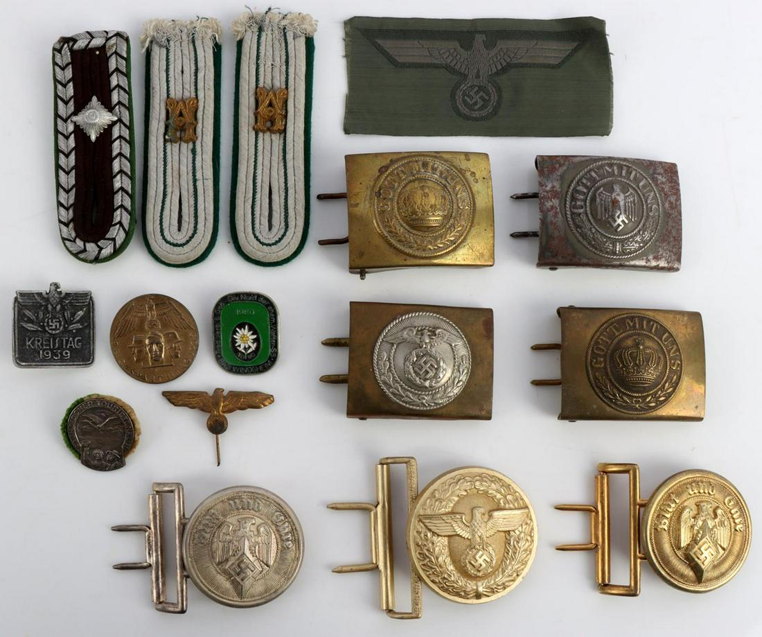 WWII GERMAN THIRD REICH BELT BUCKLE LOT OF 7: Lot features belt buckles for HEER, Hitler Youth, and police. Marks include IKA 40 and RZM M4/116. Very good condition. Measurements range 2 1/2 inches. Also included are tinnies and shoulder boards. 