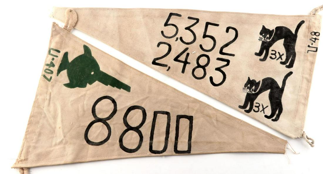 LOT 2 WWII THIRD REICH GERMAN U BOAT PENNANT FLAGS: Flags are for U-boats 48 and 407, Tonnage printed on flags. Measure 21 X 12 and 23 X 11 inches. Very good condition. Non-fluorescing.