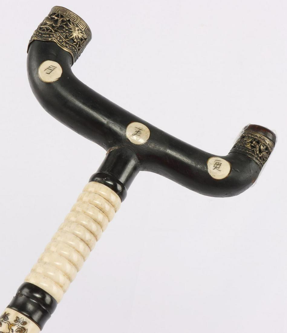 ANTIQUE ASIAN BONE WALKING STICK CANE: One of the caps is loose in grip and two of the images have fractures. Measures 36 inches.
