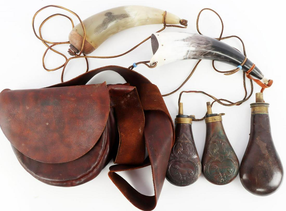 LOT OF POWDER FLASK COPPER HORN POSSIBLES BAG: With the exception of the leather covered 7 3/4 inch flask, balance appears to be great reinactor, rendezvous pieces. The two flasks are stamped Italy. Very nice and serviceable all leather possibles