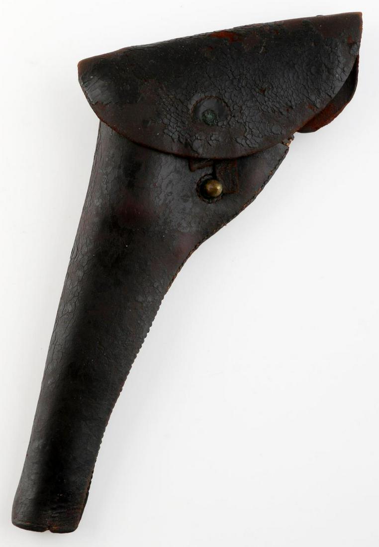 STARR SINGLE ACTION REVOLVER CIVIL WAR HOLSTER: Has old tag stating "in my collection for 25 years." Closure strap is broken and the leather is still supple but cracked at places. Nonetheless, holster is rare.