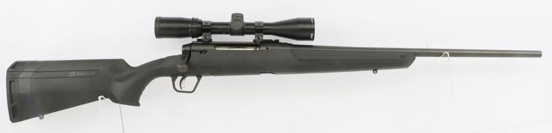 SAVAGE AXIS II 30-06 BOLT ACTION RIFLE W SCOPE: Savage Arms Axis II 30-06 caliber bolt action rifle with scope and a 5 round magazine. Bright and clear bore. 22 inch barrel. Receiver serial numbered and barrel marked maker, model, and caliber. Blac