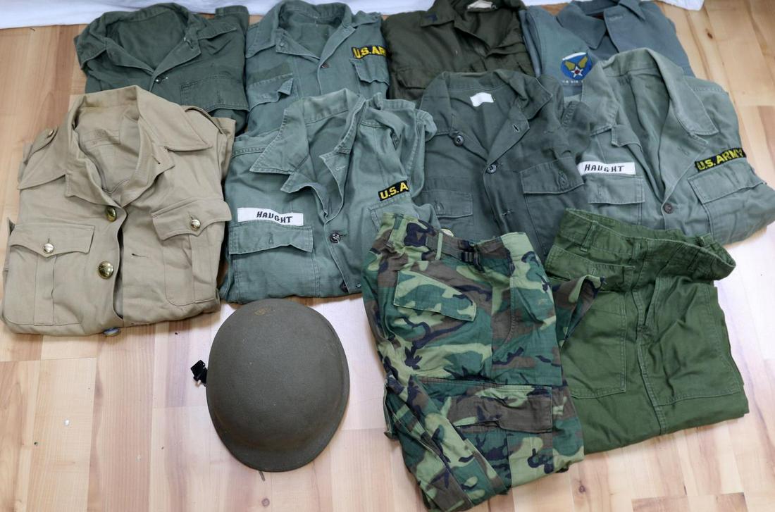 WWII TO VIETNAM SHIRT TUNIC M1 HELMET LOT: M1 helmet with 4055 heat stamp and later liner, khaki tan short sleeve tunic with belt, yoke back, rip stop and sateen trousers, size 30 and 32 waist, one medium WWII shirt with 13 star metal buttons,