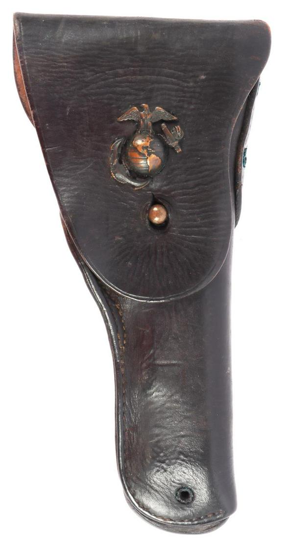 USMC CHINA MARINE TIENTSIN 3 ISLAND EGA HOLSTER: 3 Island EGA cap badge attached to a Tex Tan stamped 1911 holster in very good original condition.