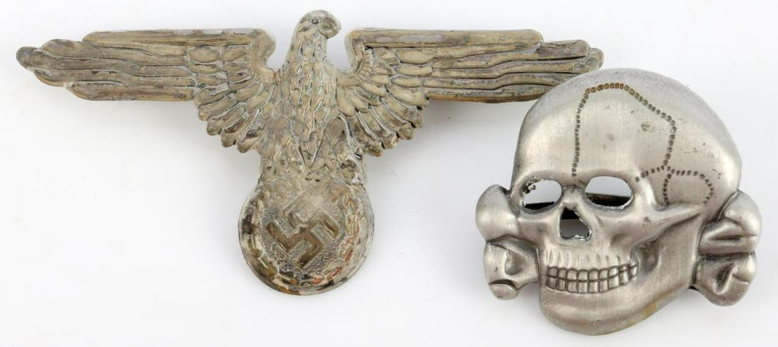 WWII GERMAN THIRD REICH SS VISOR PIN SET: SS totenkopf and Parteiadler visor set. Marked M1/52 on totenkopf. Measure 1 1/8 & 2 5/8 inches. Unauthenticated, sold as is.