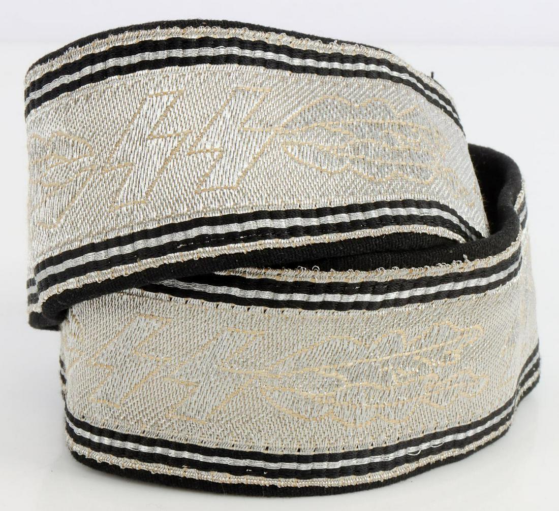 WWII GERMAN REICH SS OFFICER BROCADE BELT: Non-fluorescing. Alternating SS runes and oak leaves. Inlaid silver bullion. Belt measures 43 inches long. Very good condition.