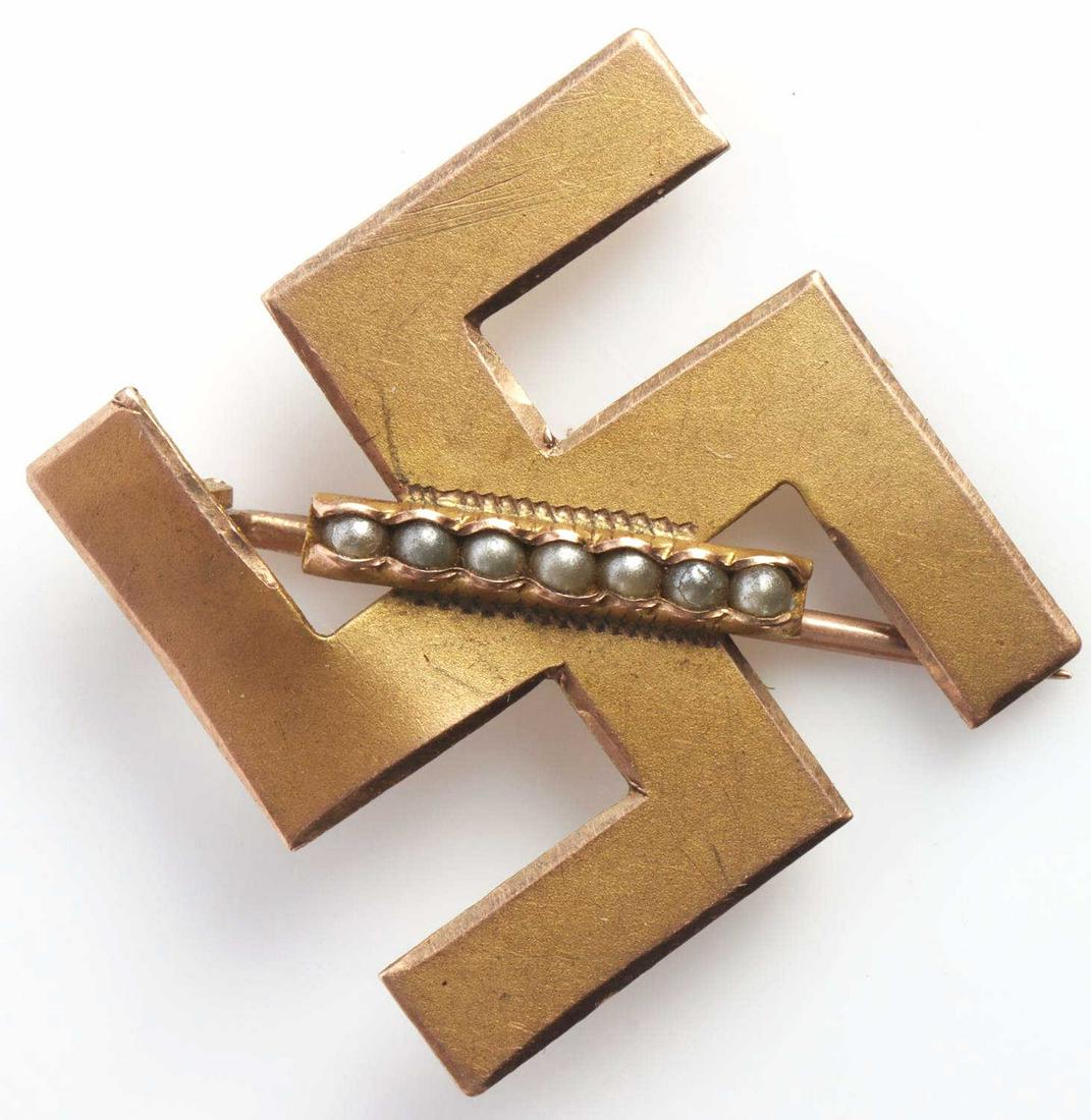 WWII GERMAN REICH 10 KT GOLD & PEARL SWASTIKA PIN: Third Reich or Right of Right, slight bend upper right, measures 10/16 th inches, weight 2 grams, stamped and tests for 10 k gold