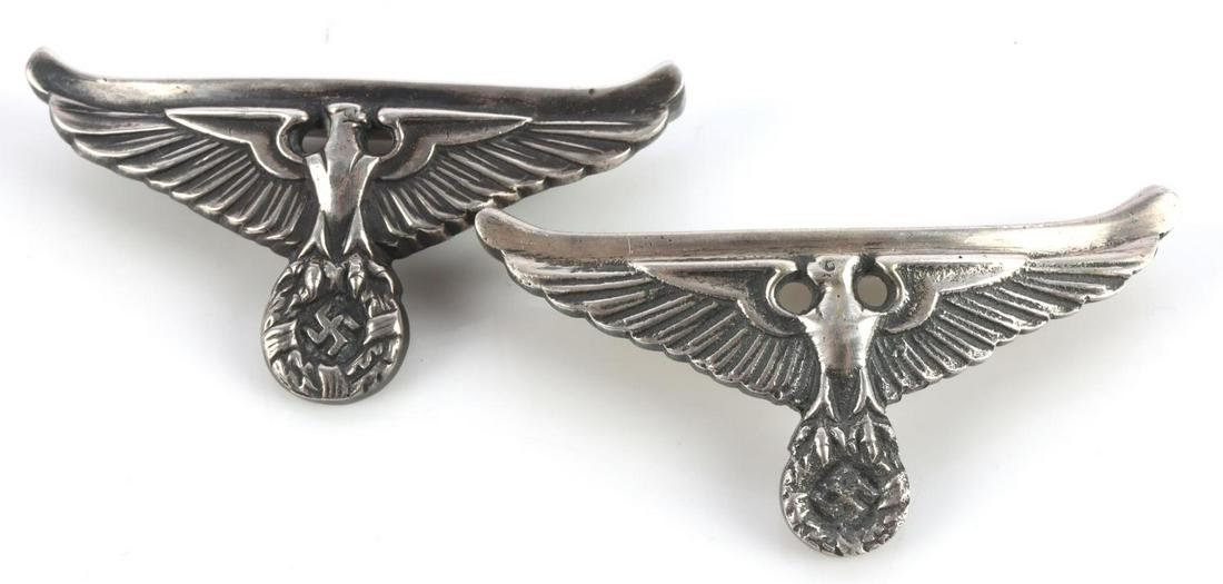 WWII GERMAN LOT OF 2 DIPLOMAT DAGGER CROSSGUARDS: 2 crossguards for a diplomatic dagger. Silvered nickel. Measures 2 3/4 inches.