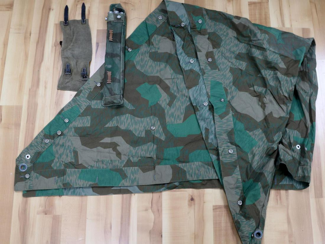 WWII GERMAN REICH HEER ZELTBAHN TENT W/ STAKES: With three stakes,and their sheath. Zelt tent itself is in good condition with no visible holes.