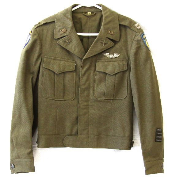 WWII AIRBORNE TROOP CARRIER CAPTAIN JACKET: WWII US Airborne Troop Carrier captains jacket, complete with bullion pilot's wings, bullion collar insignia, and rank insignia. Airborne Troop Carrier patch on left shoulder, and 9th Airborne Divisio