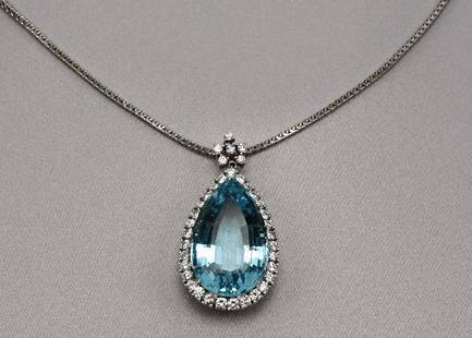 LADIES 18K GOLD AQUAMARINE & DIAMOND NECKLACE: Ladies 18K white gold, aquamarine approximately 24.08cts, and diamond estate necklace. Originally purchased from the estate of an Atlanta doctor. Features thirty eight round brilliant cut diamonds, to