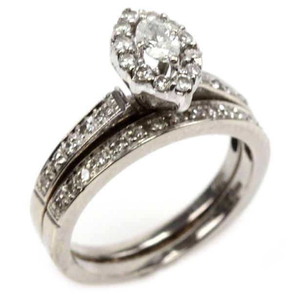 LADIES 14K WHITE GOLD DIAMOND WEDDING SET: Ladies, size 6, 14K white gold wedding ring set. Engagement ring features large marquise cut center stone, approx. 0.25 cts, surrounded by 12 round cut accent diamonds, approx. 0.03 cts., in a six pro