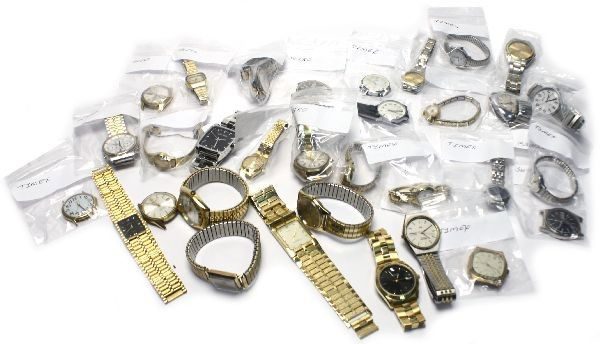 LARGE LOT OF 32 WATCHES & WATCH ACCESSORIES: Large lot 32 of watches and watch accessories including Timex, Seiko, Calvin Klein, Geneva, Waltham, and much more. Weight: 3.7 lbs Condition: Very good to poor, we do not warrant the working conditio