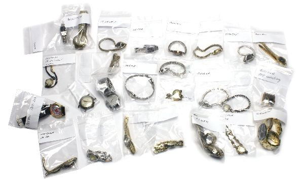 LARGE LOT OF 25 WRIST WATCHES: Large lot of 26 wrist watches and watch accessories including Bulova, Seiko, Lorus, Belforte, Gruen, Hilton, and much more. Features a Whitmauer 14K white gold watch on a stainless steel band. Weighs