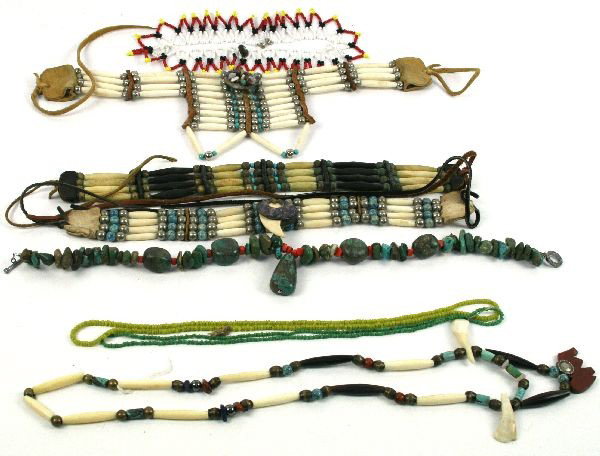 MIXED LOT OF NATIVE AMERICAN BONE CHOKERS AND MORE: Mixed lot of Native American jewelry. Including three bone chokers made with turquoise, gold, silver beads, and leather, turquoise and coral necklace, beaded Janes Collar, a mixed stone, buffalo bone 