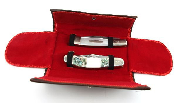 AMERICAN BLADE COLLECTORS ASSOCIATION SET: ABCA Set # 0085 of limited 3997 released in 1986. Two knife collector set, in tri fold presentation wallet. First knife has abalone and mother of pearl grips, while the second has mother of pearl grip