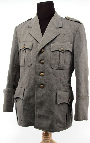 WWII ERA GERMAN ARMY TUNIC INSIGNIA REMOVED: WWII German army tunic. Insignia have been removed. Outline of eagle breast insignia shows on inside of coat. Some wear from age and small repair to right sleeve. Overall good condition. Also included