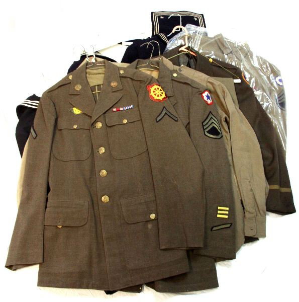 DEALERS LOT OF U.S. WWII ENLISTED UNIFORMS: Eleven piece collection of WWII U.S. enlisted men's uniforms, Navy, Army, IKE jackets, trousers and more.