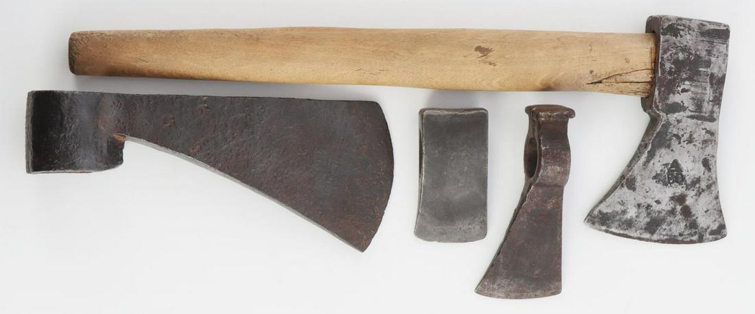 4 FUR TRADE AXE LOT 1 COMPLETE 3 AX HEAD ONLY: All are forged iron. The complete axe is stamped A over BD and measures 6x16 inches, the 8 1/2 inch blade has a C like cleek mark on each side, the two lesser heads are unmarked and measures 5 and 3 i