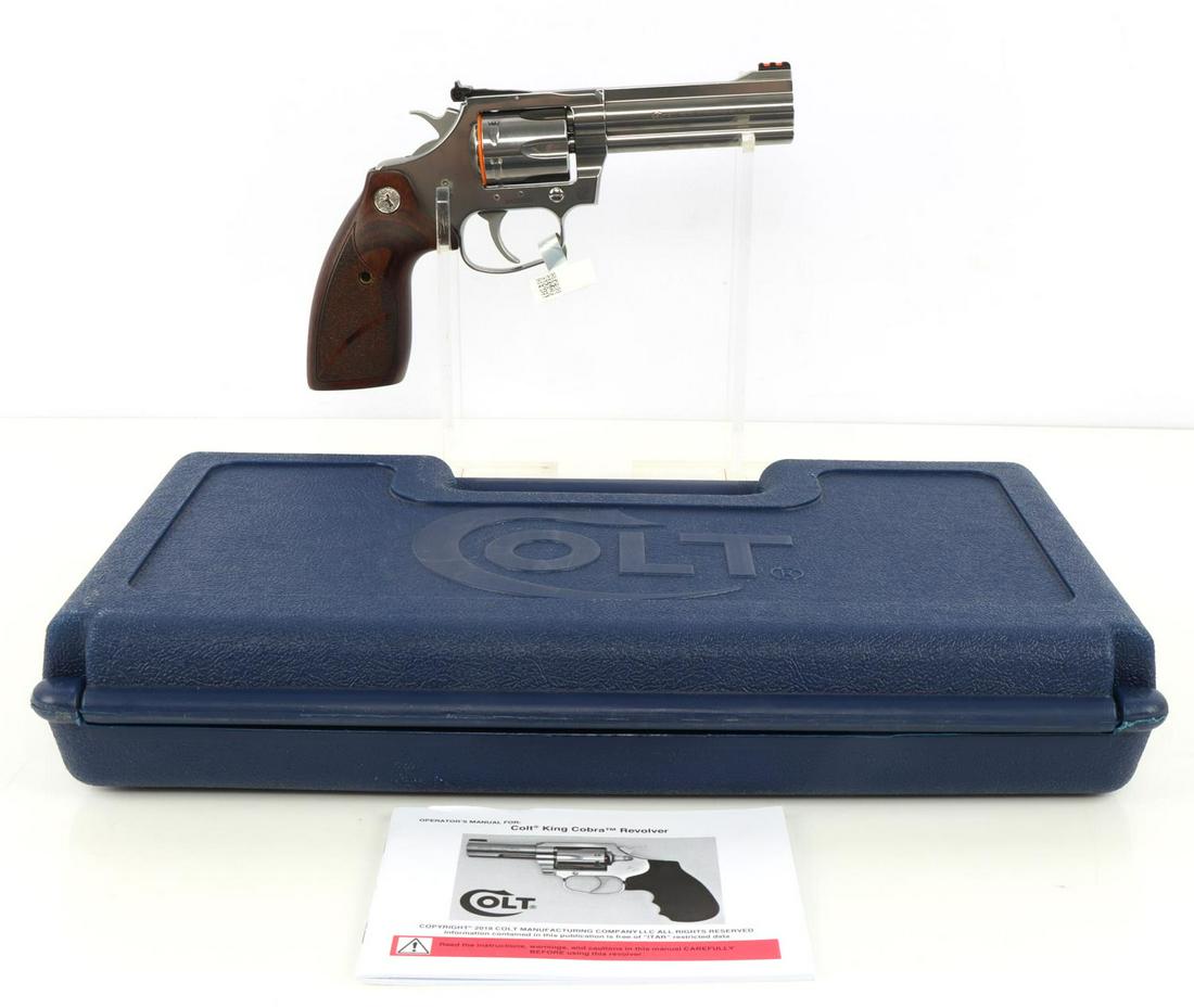 COLT KING COBRA 357 MAGNUM REVOLVER IN BOX: Never fired Colt King Cobra 357 magnum. Barrel measures 4 1/4 inches long and features a bright and clear bore. Action is smooth and functions without issue. In original box with owner's manual. Gun s