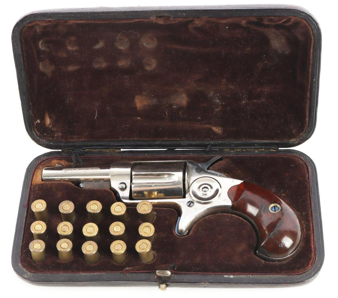 ANTIQUE CASED COLT NEW LINE 32 CAL REVOLVER: 2 1/8 inch barrel. Action is smooth and functions as intended. Spur trigger. Nickel finish. Very good condition overall. Most finish remains. Good bore but needs cleaning. C&R or FFL required for tran