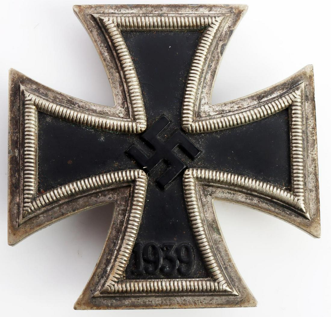 WWII GERMAN THIRD REICH IRON CROSS FIRST CLASS: 2 piece construction with magnetic core. No marks. Measures 1 3/4 inches. Very good condition with toning.