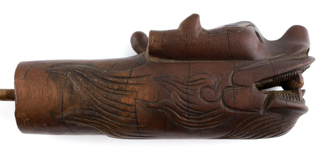 FOO LION DAGGER SWAGGER STICK CANE: Pearl in mouth Foo lion dagger head. Measures 9 inches with blade, in stick 20 inches. Old damage to right ear.