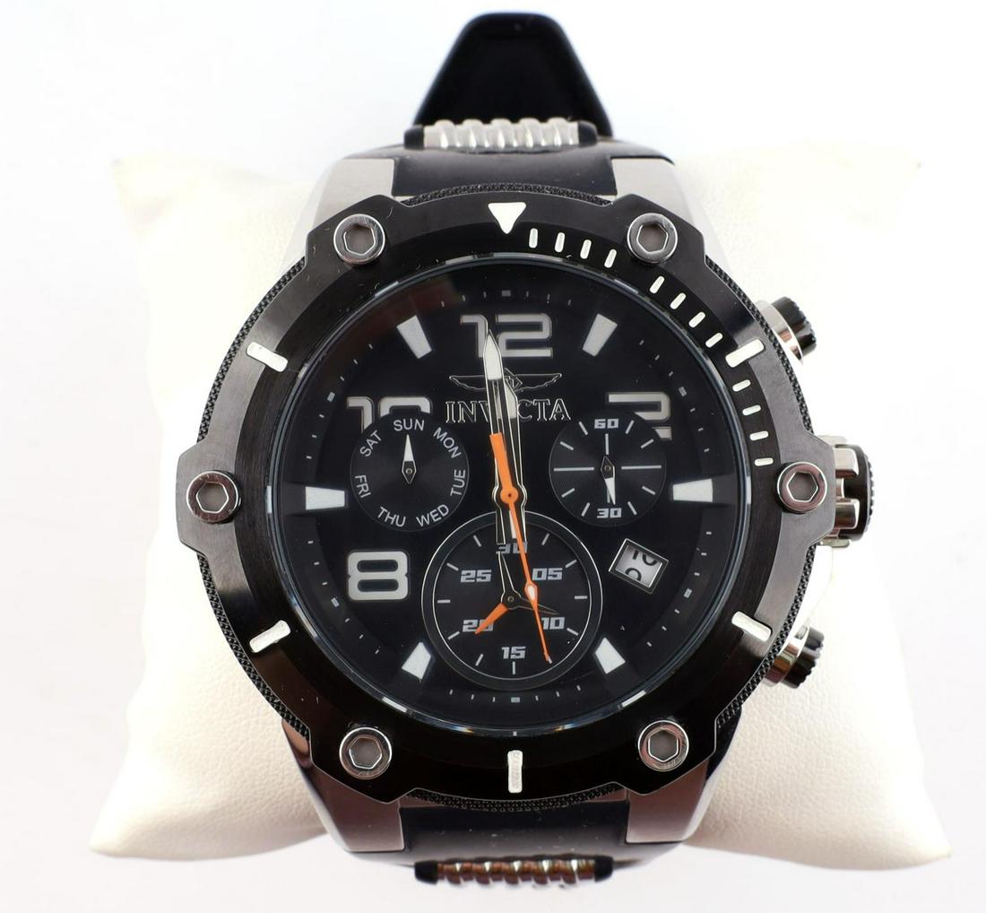 INVICTA MENS 17202 SPEEDWAY CHRONOGRAPH WATCH: Preowned in like new condition Invicta Men's 17202 Speedway Analog Chronograph functions as per company specs: 60 second, 60 minute and 24 hour sub dials, black dial with silver tone, white and orange