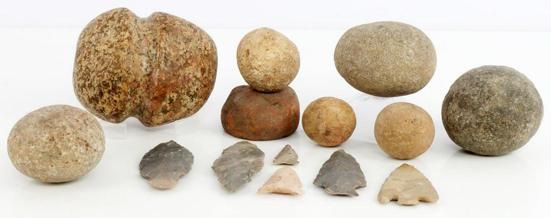 14 NATIVE AMERICAN ARROWHEADS & STONE GAME BALLS: Lot includes: 2 Adena arrowhead points from Logan Co, Kentucky. Both are grey chert, wider point has rounder base and broad flake pattern while the other one has triangular base, broad flaking, and sm