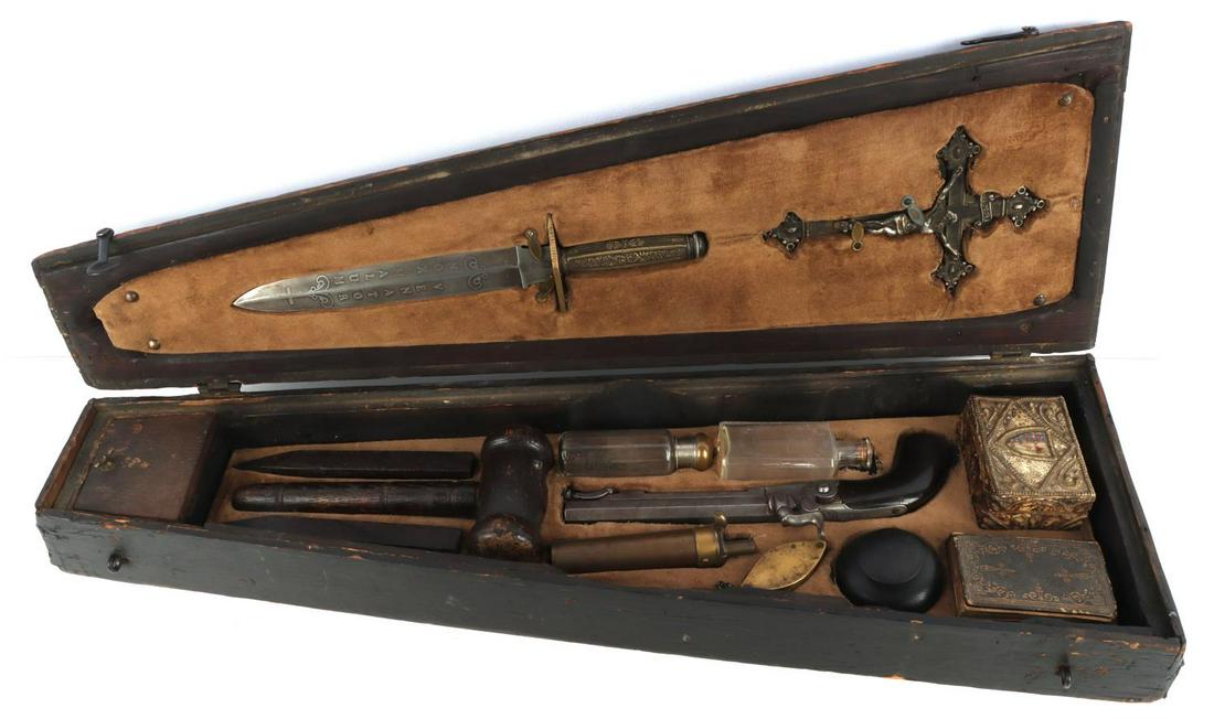 CASED ANTIQUE EUROPEAN VAMPIRE KILLING KIT: Antique European vampire killing kit in case. One steel and ebony Belgian percussion pistol. Belgian marks. Oxidized bore. 3 1/4 inch barrel. Does not stay engaged. One dagger with brass handle and et