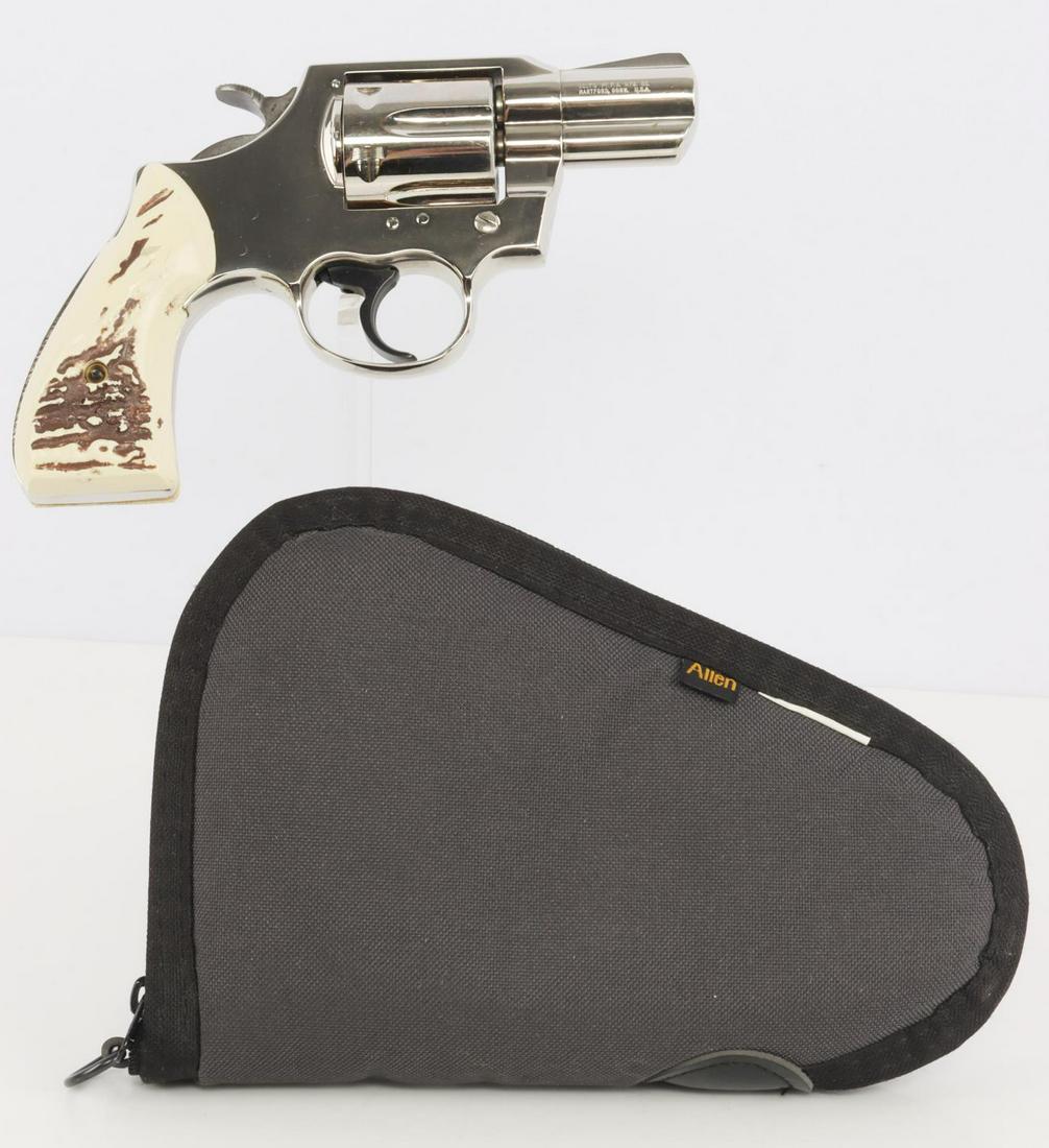 COLT LAWMAN MK III .357 MAGNUM 6 SHOT REVOLVER: Colt Lawman MK III .357 Magnum caliber 6 shot revolver. Bright and clear bore. 2 inch barrel. Barrel marked maker, model, and caliber. Frame near cylinder serial numbered. Stainless steel with faux ho