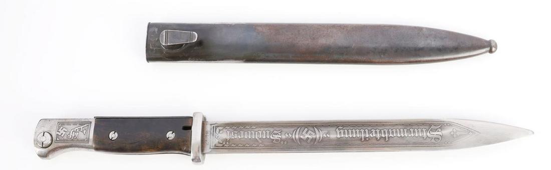 WWII GERMAN REICH SA ETCHED K98 PARADE BAYONET: Blade measures 9 3/4 inches long and features etchings on both sides "STURMABTEILUNG SUDWEST" & "S.A. ALLES FUR DEUTSCHLAND." Mark on ricasso reads "S/239.K" and the other side reads "2516." Scabbard 