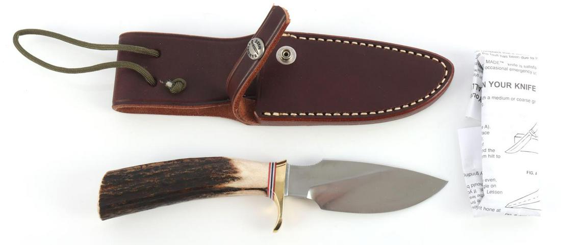 RANDALL MADE MODEL 11 ALASKAN SKINNER KNIFE: Randal Made Model 11 has a 4" blade of 3/16" stock, 4 1/2" and 5" blades of 1/4" stock. The top of the blade in front of the hilt is notched for thumb placement. Brass single hilt. Customized with sta