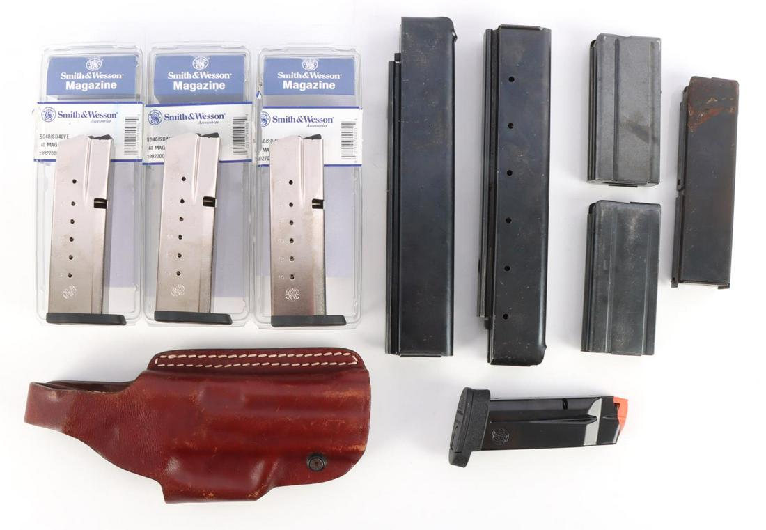 LOT OF 10 M1 THOMPSON CARBIN S&W MAGAZINES: Lot features M1 Thompson and carbine magazines, Smith & Wesson magazines, and a holster. Very good condition.