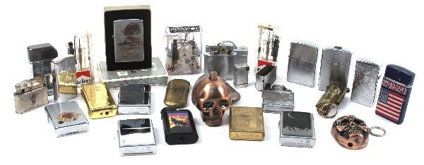 CIGARETTE LIGHTER COLLECTION ZIPPO AND NOVELTY: Collection of cigarette lighters consisting of eight Zippos, one of which is USS Coral Sea (has some rust), an additional seventeen non-Zippos. Overall in good to fair condition. Interesting novelties