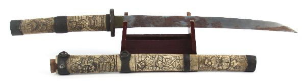 ANTIQUE JAPANESE SWORD CARVED BONE SAYA: 14 inch blade, carved saya and handle. Fair condition with oxidation and damage to saya.