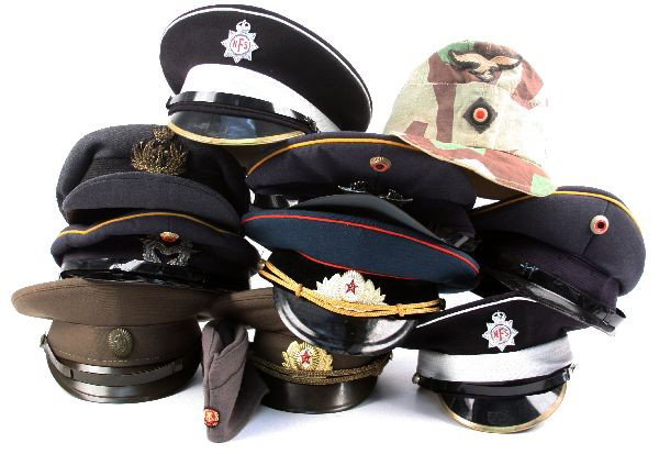 LOT OF 11 VARIOUS WORLD MILITARY HATS: Grouping of 10 various military hats and visors. Soviet, East German, WWII German M43 Afrika Corps tropical hat (possibly reproduction), and more. All are ranging from good to excellent in condition.