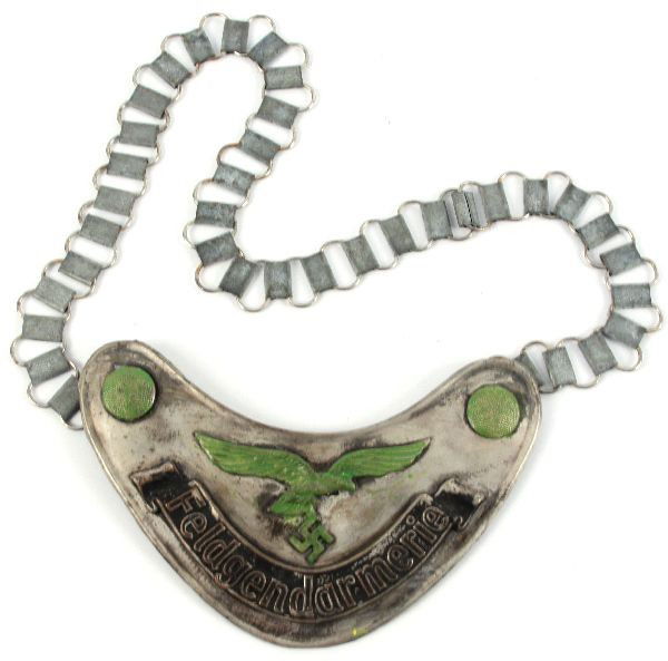 WWII GERMAN LUFTWAFFE FELDGENDARMERIE GORGET: WWII German Luftwaffe Feldgendarmerie field police gorget. Luminescent paint has been touched up, otherwise very good condition, complete with chain.