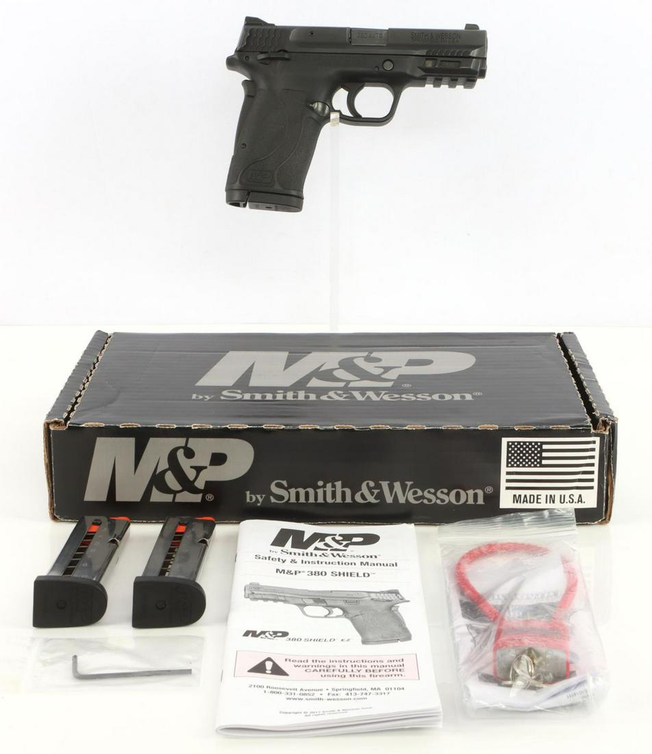 M&P SMITH & WESSON 380 SHIELD SEMI AUTO PISTOL: In very good condition featuring a bright and clear bore with good rifling. Well kept. Action is smooth and functions without issue. Three magazines present. In original box with original paperwork. F