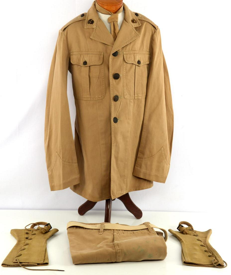 1930 USMC NAMED CHINA MARINE KHAKI UNIFORM: Tunic , trousers, belt , leggings, unmatched collar EGA's, named to Charles D. Naef, served on USS Lexington among other stations 1930-33, small size, very good original condition.