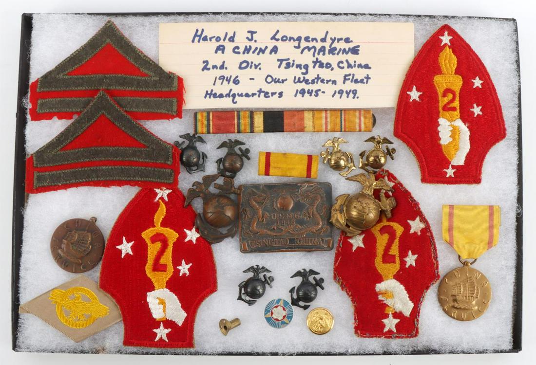 USMC NAMED CHINA MARINE MEDAL EGA BELT PATCH LOT: China Marine Harold J. Longmendyre 2nd Division, Tsingtao China, in country belt buckle, EGA's medals, two 3 island visor EGAs, and more. Medals are not named.