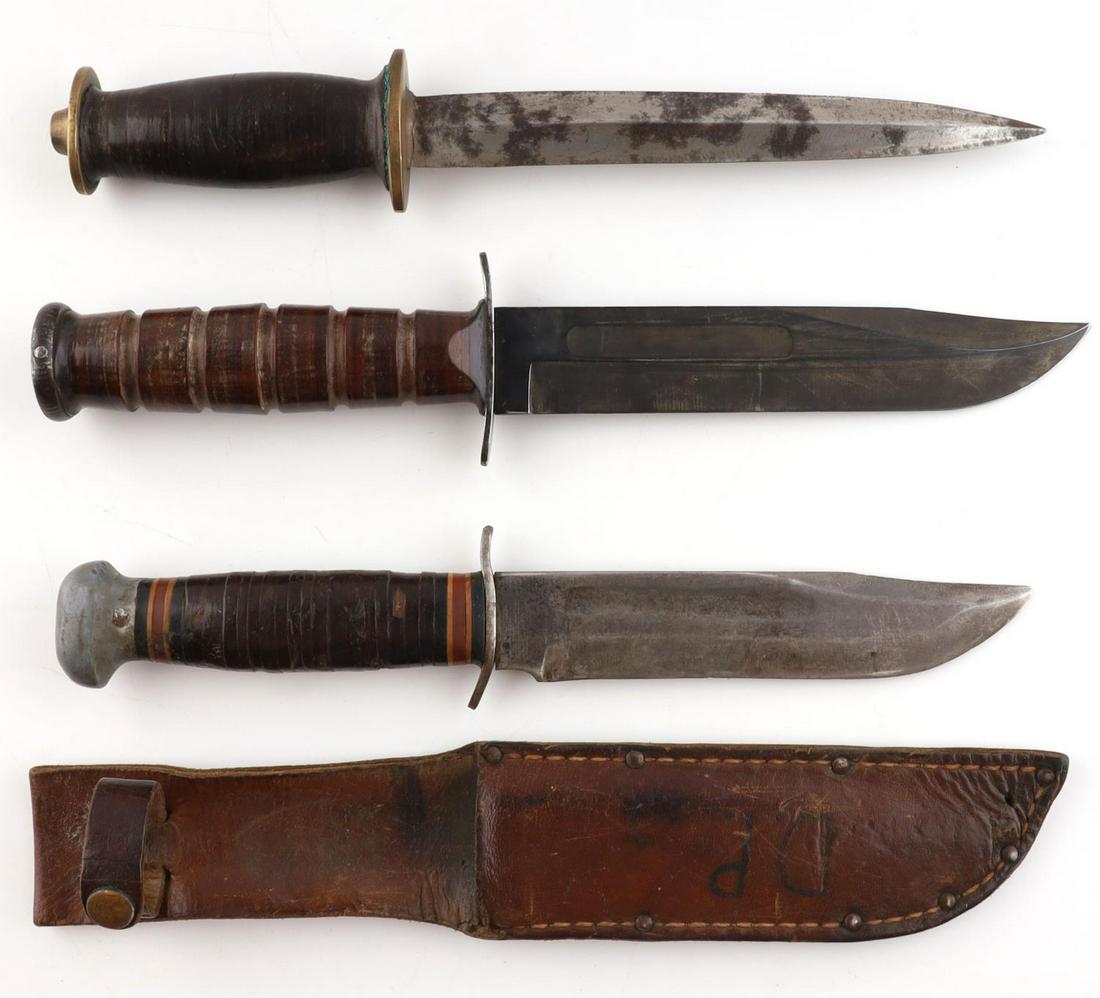 WWII US NAVY CAMILLUS RH PAL FIGHTING KNIFE LOT: Includes USN Camillus MK2 knife, a RH Pal 36 knife, and an unmarked fighting knife. Pal knife is the only one with a sheath. All in good condition.